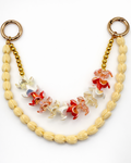Kenna charm in Puakenikeni with gold-tone clasp and floral-inspired translucent beads