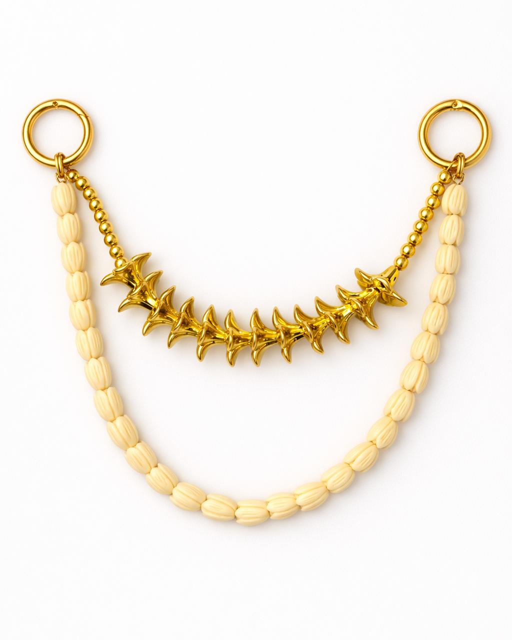 Bag charm with double strands of gold plumeria and pikake; Hawaii inspired 